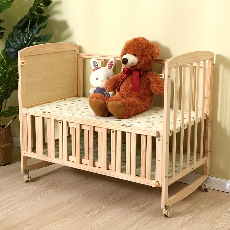 Multifunktionales Babybett aus Massivholz